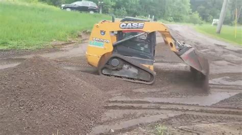 slope grading with skid steer|grading driveway with skid steer.